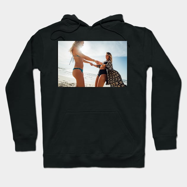 Two Young Pretty Girls Having Fun Together on Sunny Beach Hoodie by visualspectrum